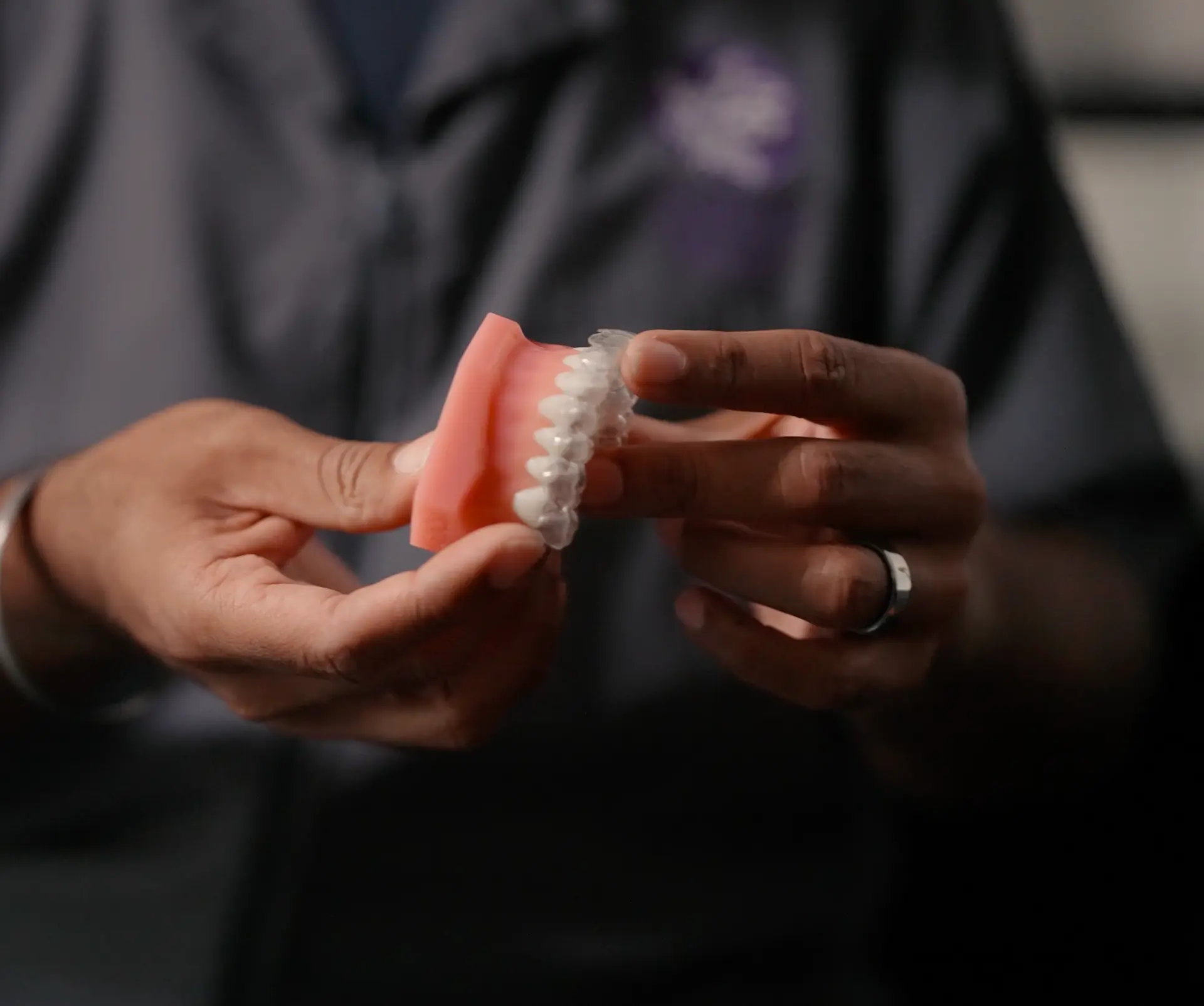 Close-up of a clear Invisalign aligner on a dental model at Cadbury Dental, Birmingham